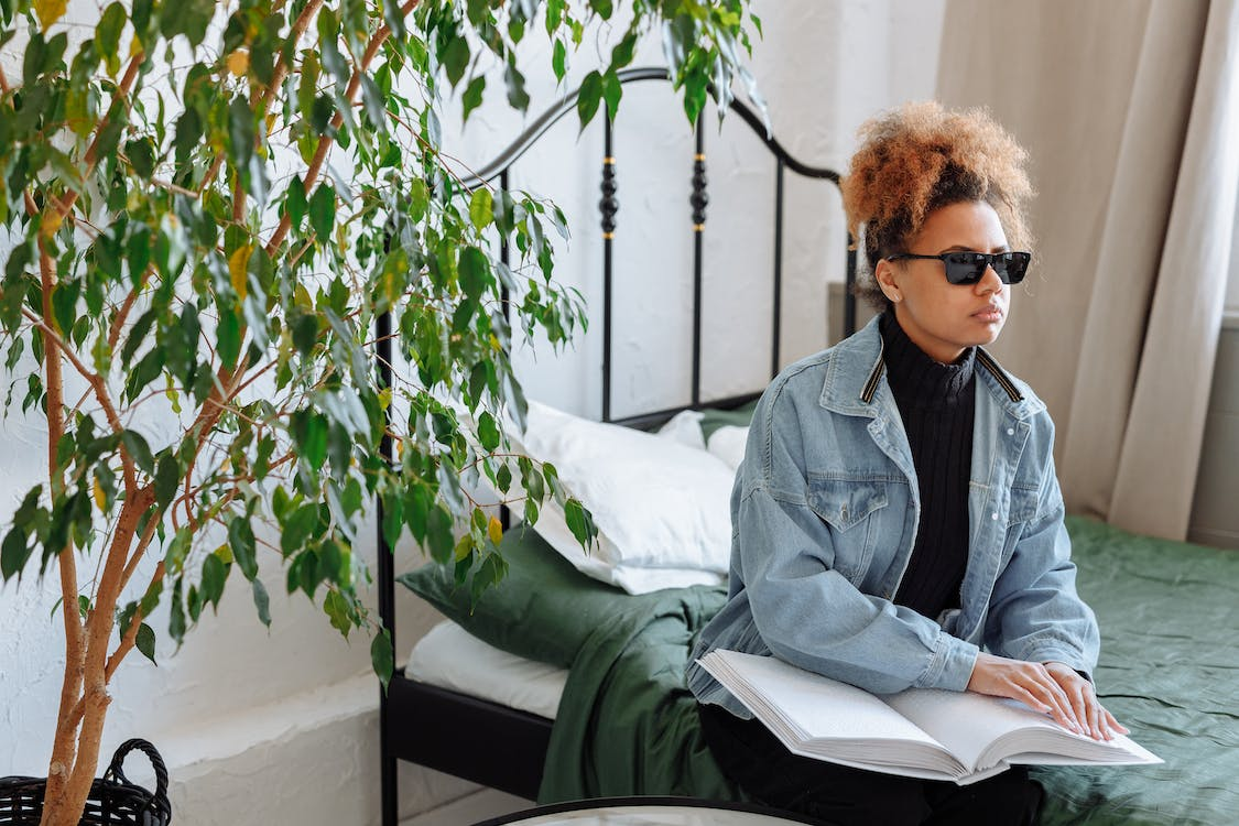 Woman reading braille